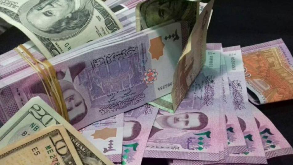 سعر جديد لليرتين السورية والتركية أمام الدولار