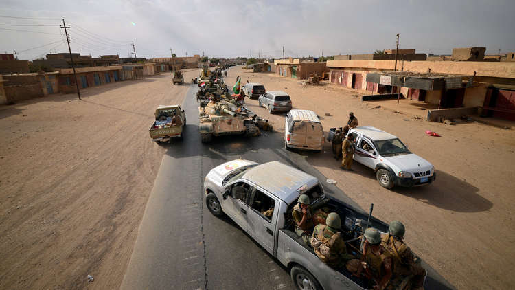 توتر بين الحشد الشعبي والدفاع الوطني في البوكمال